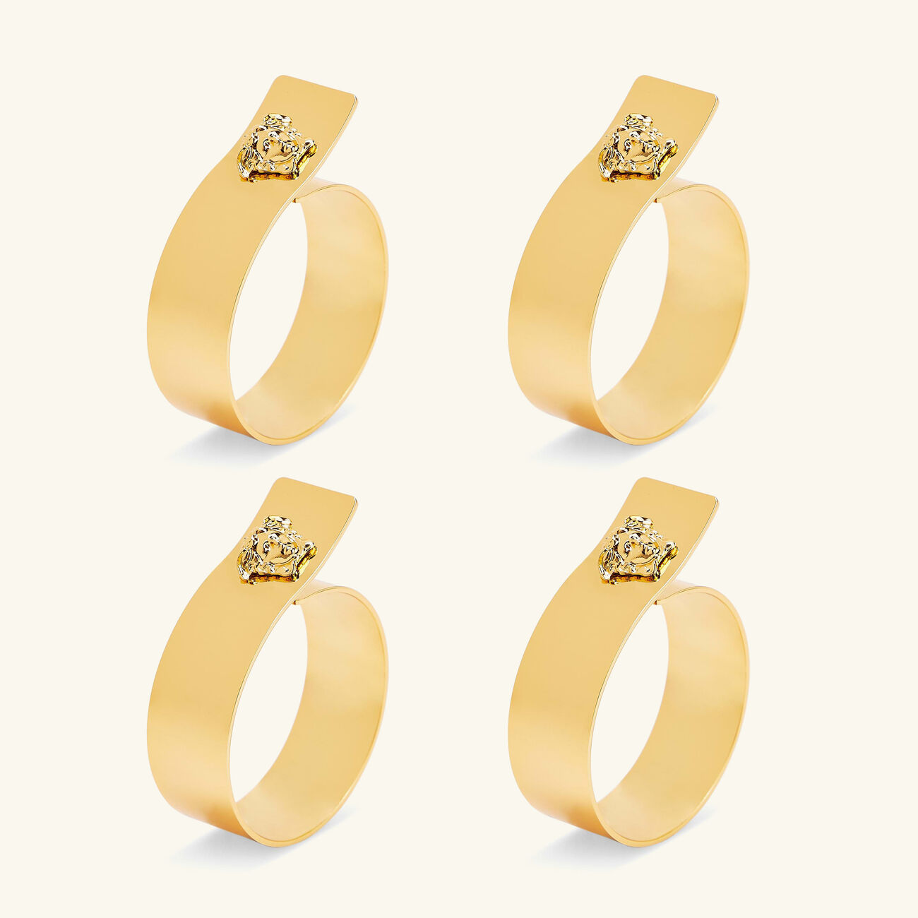 فيرساتشي طقم حلقات مناديل المائدة ميدوزا من 4 قطع باللون الذهبي