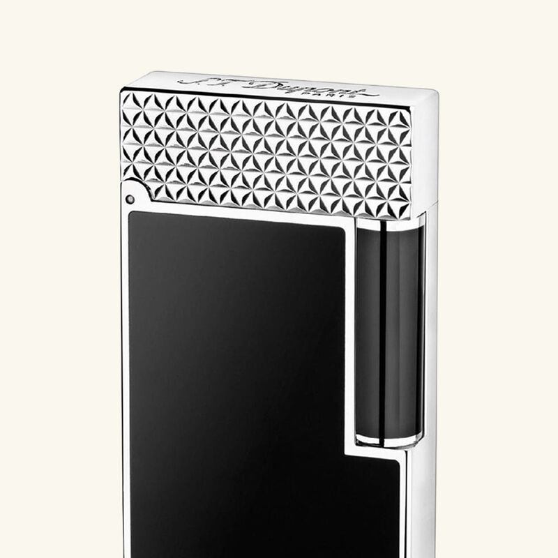 s t  dupont paris is renowned for luxury lighters  collectible pens  perfumes  and premium accessories  founded in 1872  s t  dupont blends innovation with timeless elegance  featuring the iconic diamond head pattern and exceptional french craftsmanship in every handcrafted piece ولّاعة لين 2 مطلية باللون الأسود مع بالاديوم